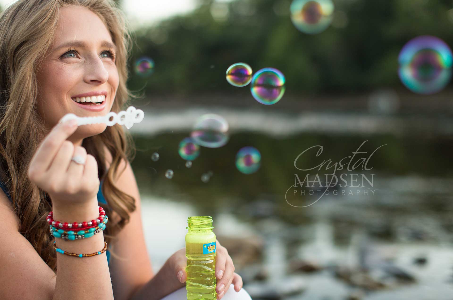 bubbles in high school senior pictures for props
